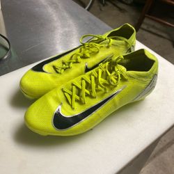 green Nike cleats