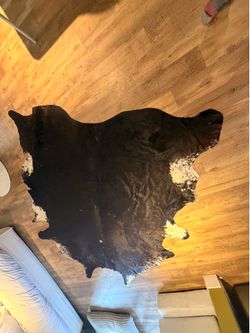 Cowhide floor rug