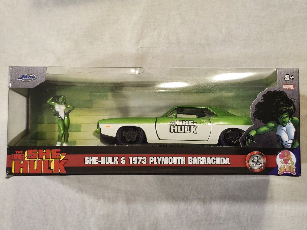 JADA METAL DIECAST CAR 1:32 SCALE. MARVEL THE SAVAGE SHE HULK. 1973 PLYMOUTH BARRACUDA AND SHE HULK METAL DIECAST FIGURE.