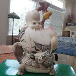 ORIENTAL DECOR A SIT TORTOISE MACROBIAN MAN WITH  PEACH