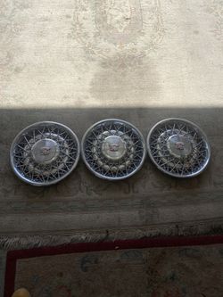 Cadillac Spoke Wire Hubcaps And Cadillac Stock Radios