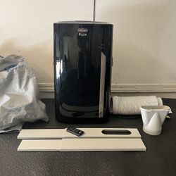 Portable Air Conditioner w/attachments & cover / bag (1200 btu)- $240