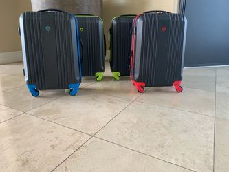 4 Matching Carryon Luggage - Black / Color Wheels