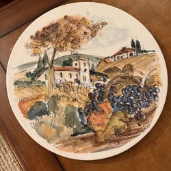Hand decorated ceramic plate