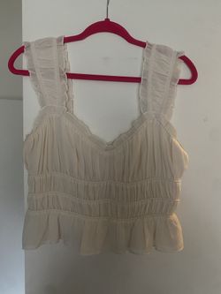 Ruffle top for woman.
