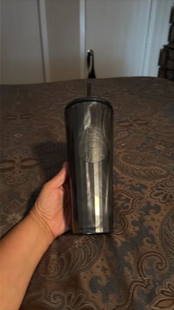 This Starbucks Marbled Black Pearl Venti Cold Cup features a unique iridescent marble design and a dome lid 24 oz sku #011161876
