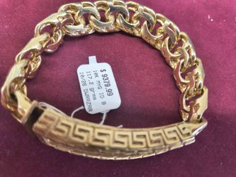 10ksolid gold I'd breaclte 117 grams layaway available 10% Dwon if you interested please make sure you ask for Maribel thank you