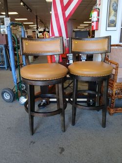 Pair of Swivel Bar Stools with Back