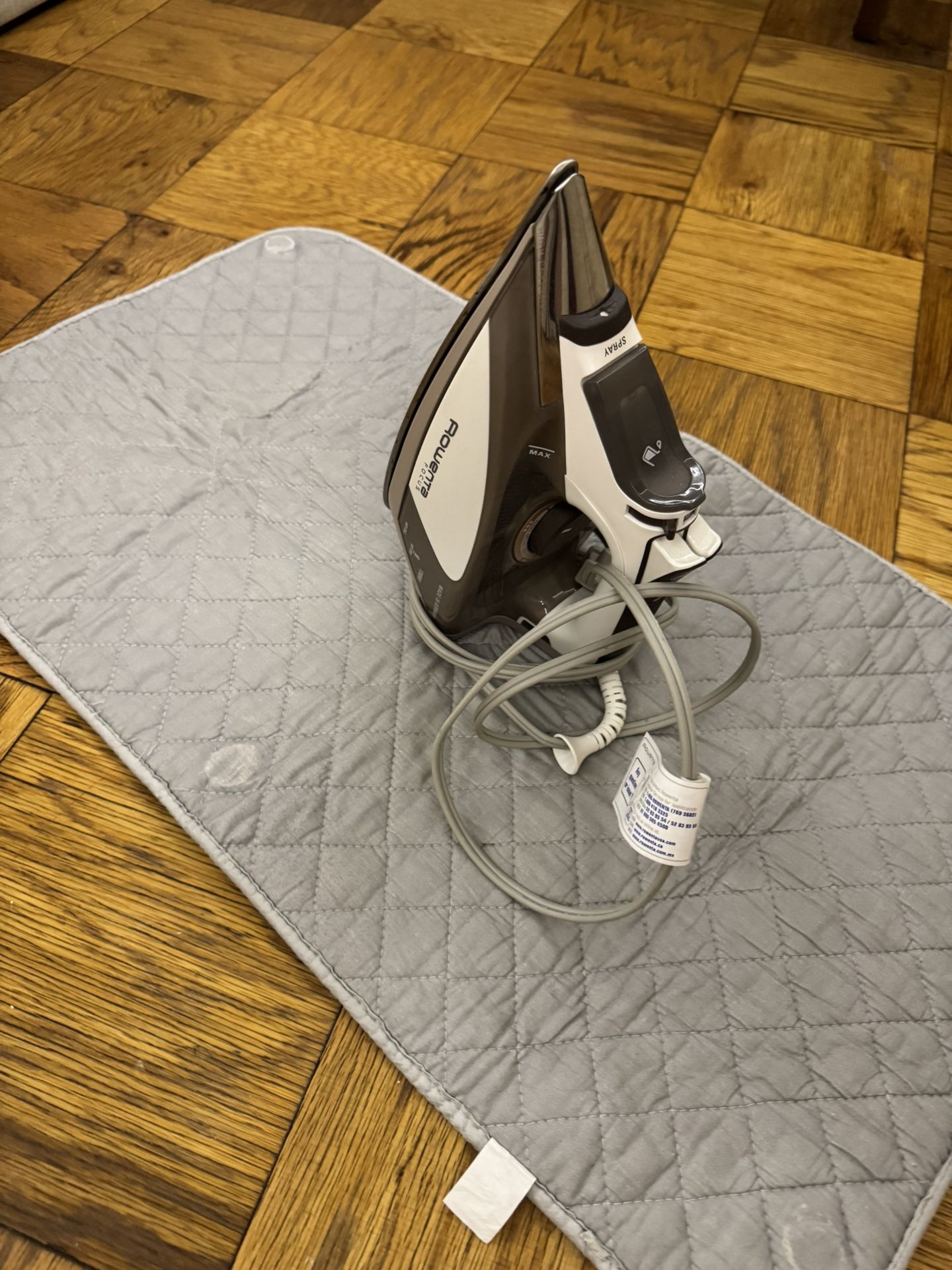Iron with pad