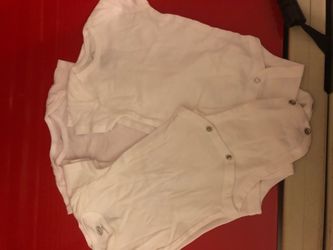 Pack of 5 white onesies.