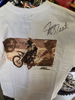 Jeremy McGrath Autographed (NOS 90'S) No Fear Tshirt with original tags.