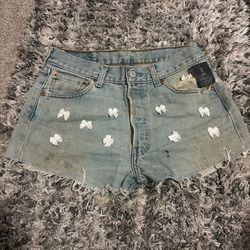 Light denim bow shorts