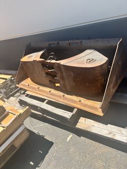 MT-55 backhoe bucket and loader