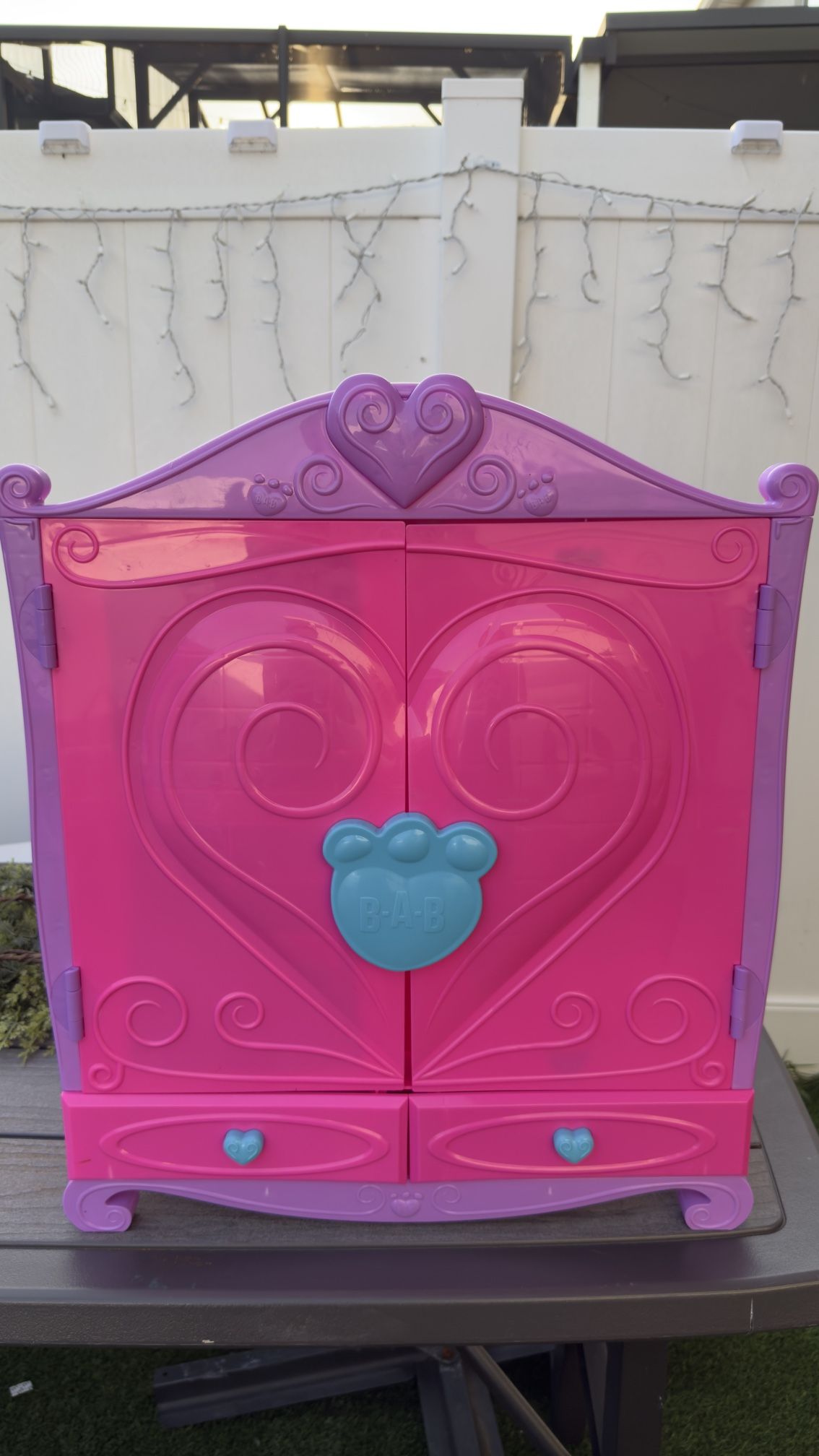 Selling pink doll cabinet, 22x18.5x9.5 inches.