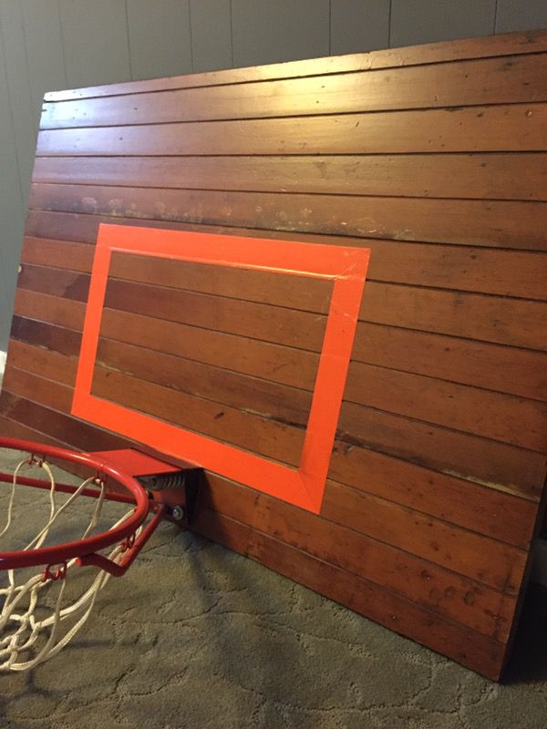 Awesome reclaimed 125 year old Fir basketball backboard with modern break-away hoop.