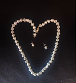 Pearl necklace and earrings sold separately