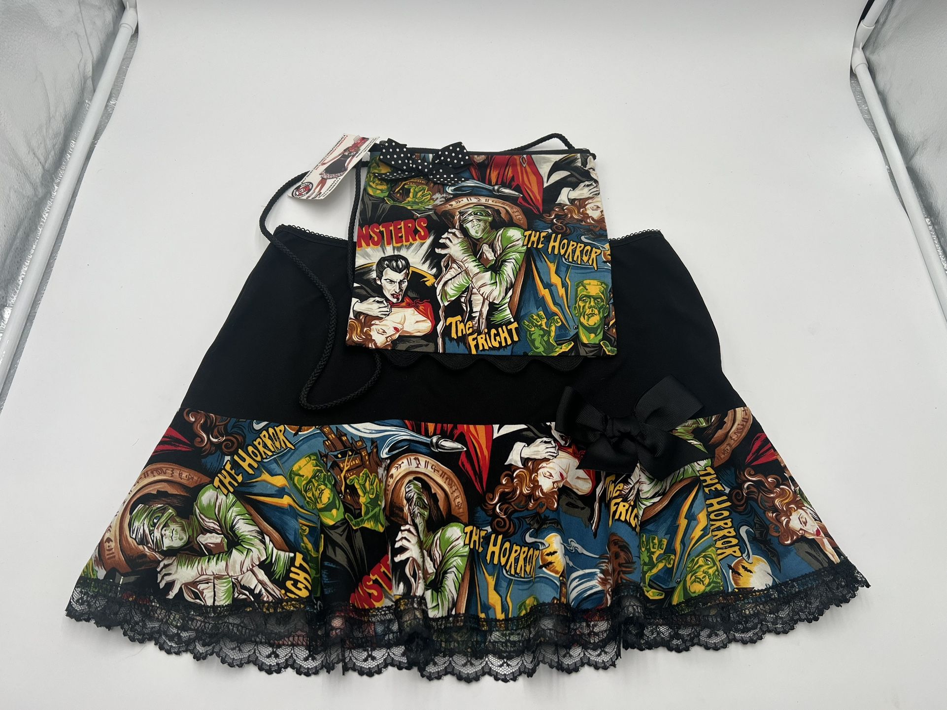 Woman’s Skirt And Purse