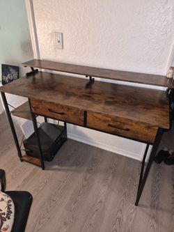 Home office setup desk, chair, and epson printer