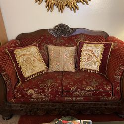 Red Antique Wood Couch with Pillows