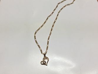 Rose gold necklace and heart pendant with crystal