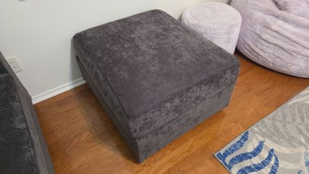 Lovesac sectional add on storage with gray cloth cover