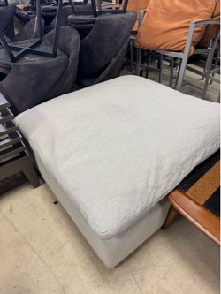Down-Filled Overstuffed Ottoman featured in a light beige fabric - 42” x 42”