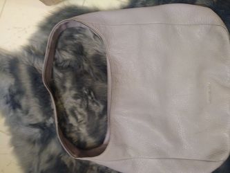 Super cute michael kors purse. A lil wear on inside of the strap. But great condition! 60$