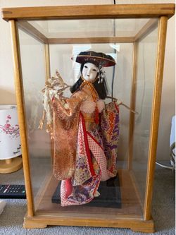 Japanese doll in case