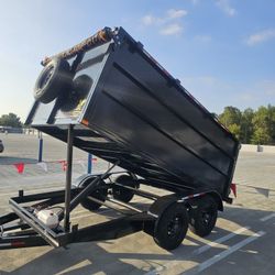NEW DUMP TRAILER 12X8X4 12000 LBS
ROLLING TARP--SPARE TIRE,ELECTRIC BRAKES,HYDRAULIC SYSTEM,REMOTE CONTROL,IDEAL FOR HAULING, DEMOLITION, TRASH ETC, 