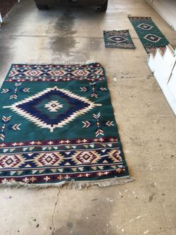 Three Navajo rugs