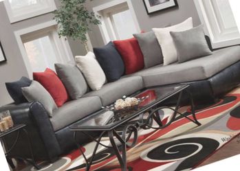 Black and grey sectional with pillows!