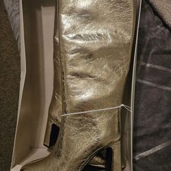 Brand new women gold boots 