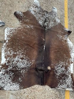 Brown and White Speckled Cowhide Rug