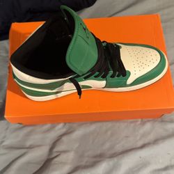 Black and green Jordan 1s