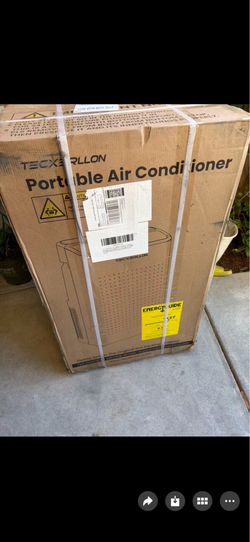 Air conditioner new in the box  with one year warranty
