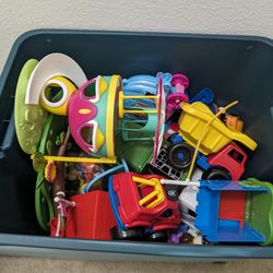 A Box Of Toys With Box 