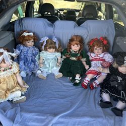 Collectible Marie Osmond Porcelain Dolls.  $25 Each.