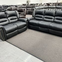New Reclining Couch  / Love Seat .  Black Leather .  Free Delivery !