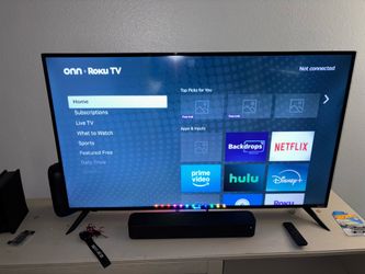 55’ tv Roku tv with surround sound