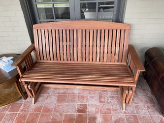 Brown rocking bench