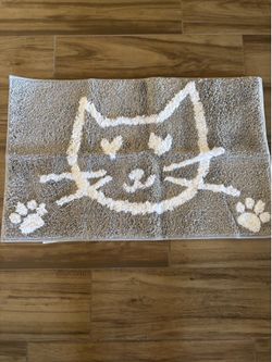 Glow in the dark cat floor mat