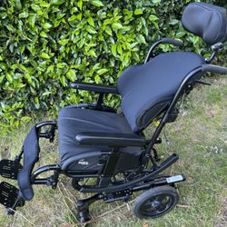 Manual wheelchair with Tilt-in-Space reclining function and Matrx Elite backrest system.