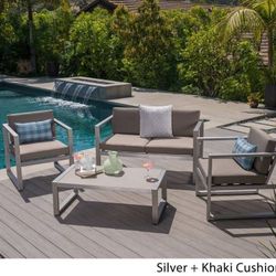 Outdoor patio sofa with chairs and coffee table