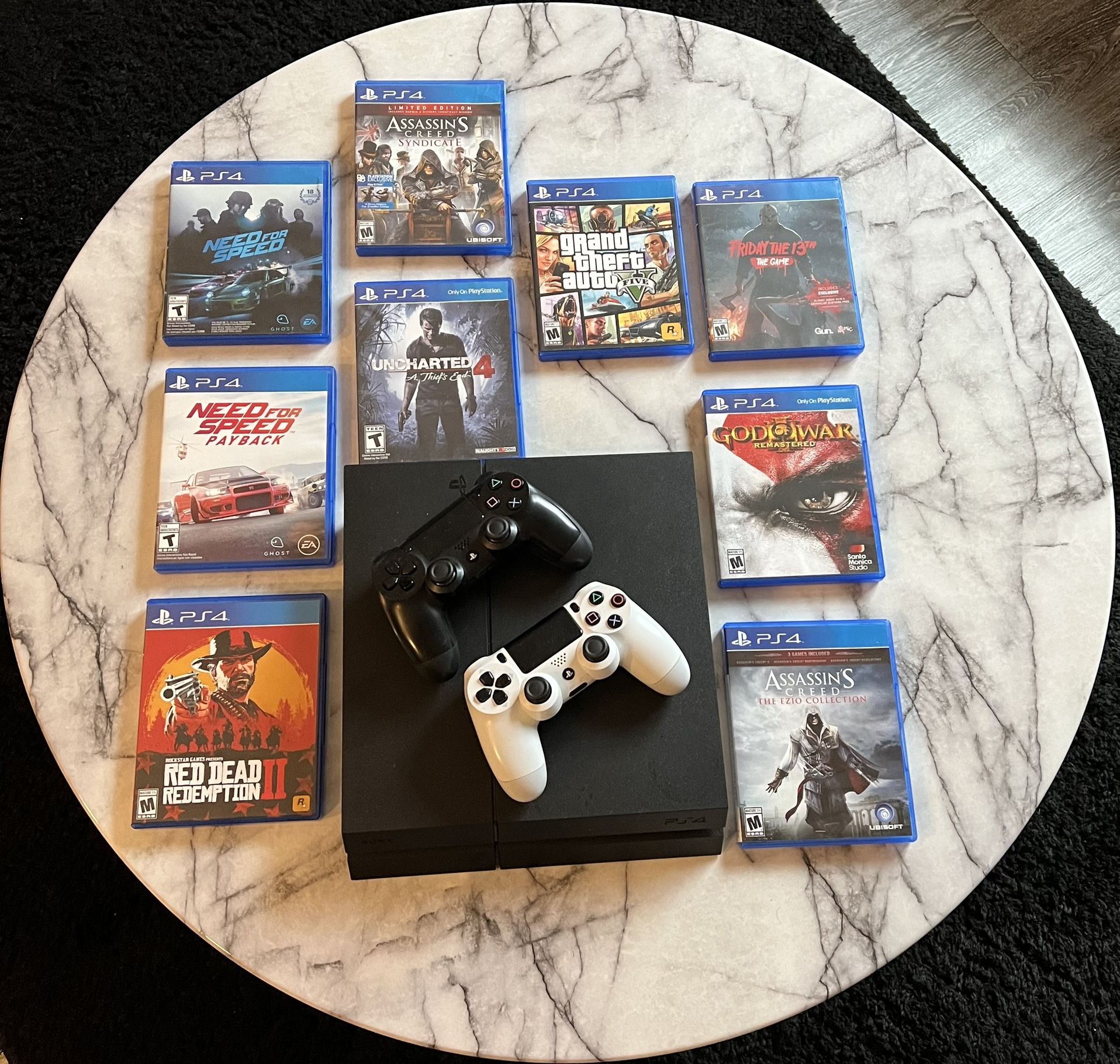 PS4 w/ 2 Controller & 9 Games