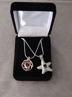 Two Silver Pendant Necklaces with Gemstones