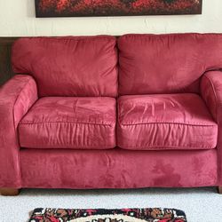red microfiber love seat