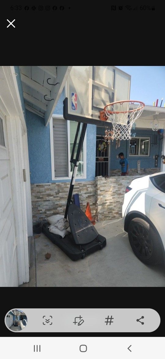 Adjustable Basketball Hoop $60 Solid Backboard