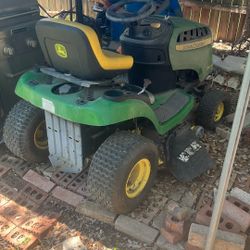 John Deer Riding Mower And Wagon