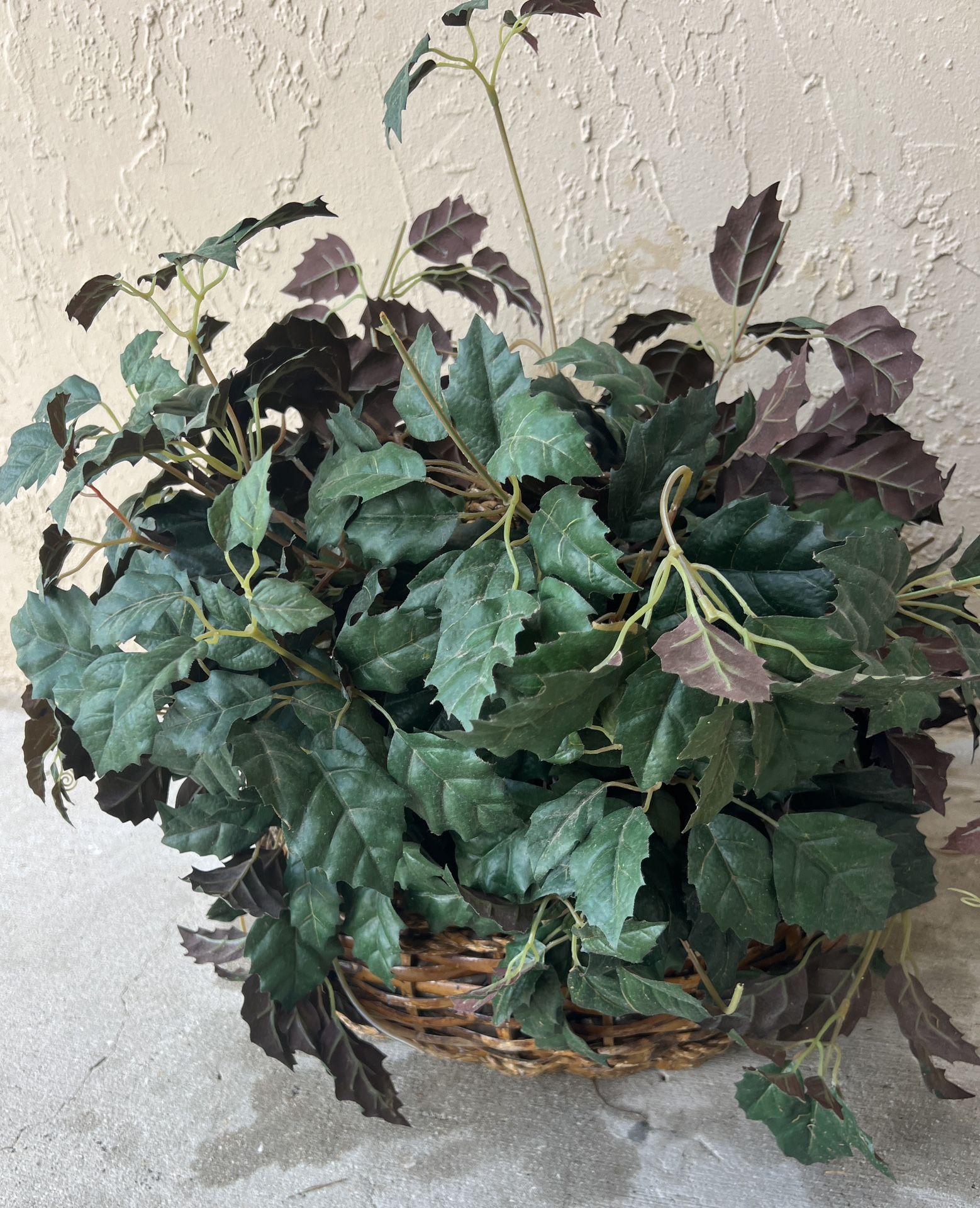 basket with artificial plant