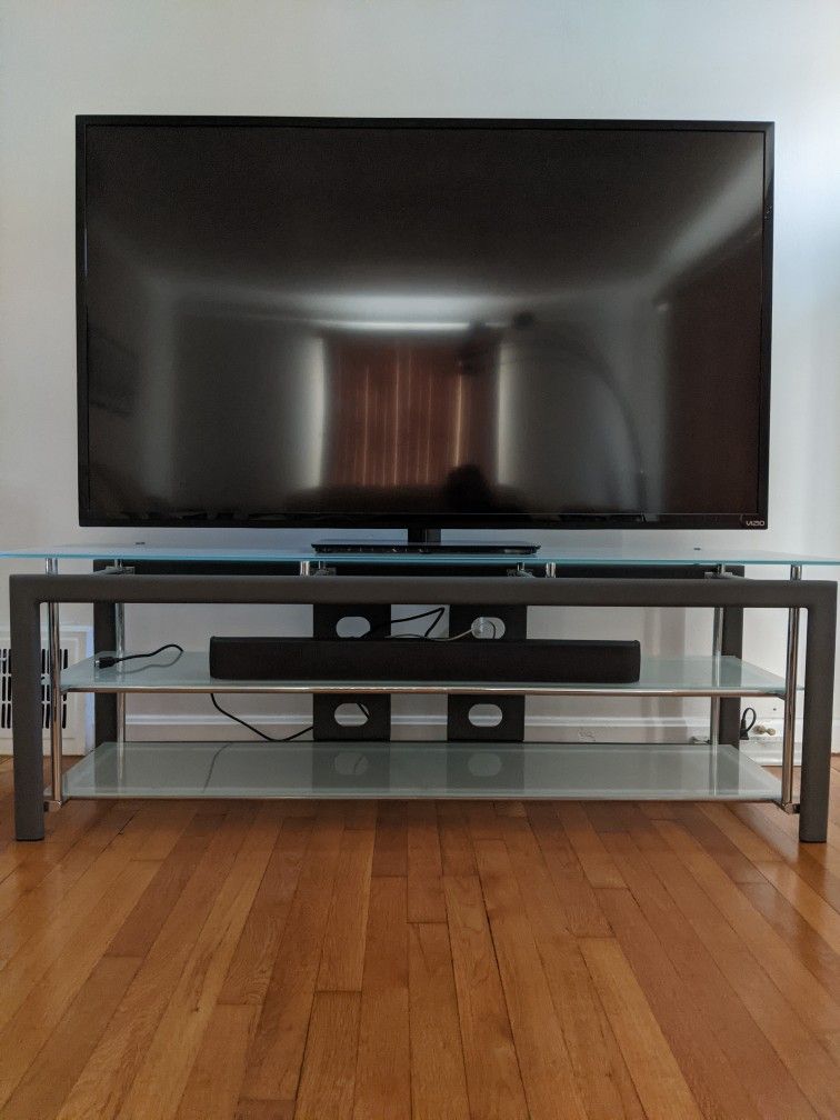 TV Stand (Glass and Metal)
59 x 18 x 20

Excellent condition.
Pickup only in Mayfield Heights. Thanks.